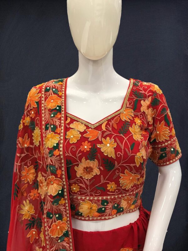 Red Lehenga Choli with Aari, Tilla & Cut Daana Embroidery