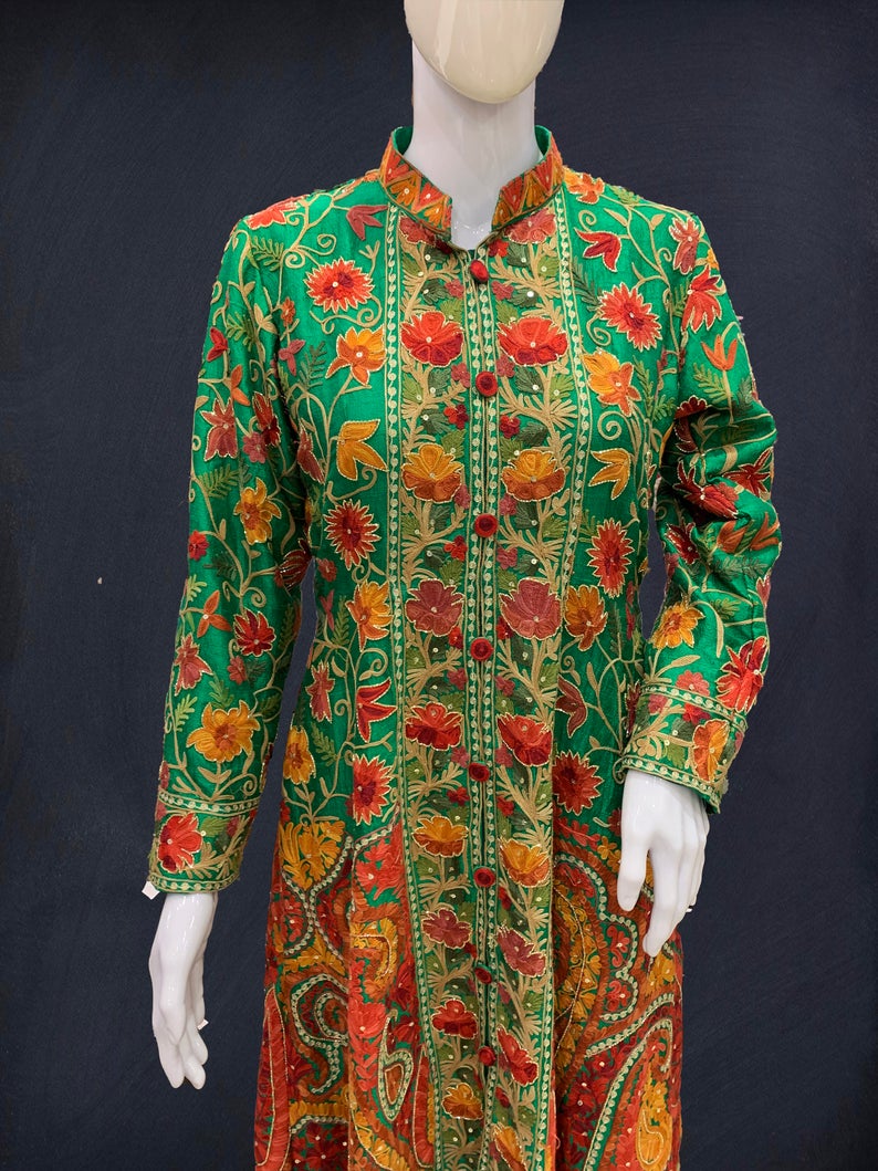 Green Flared Suit Dress With Pastel Embroidery and Cut Daana Highlighting Green Flared Suit Dress With Rich Embroidery and Cut Daana Highlighting