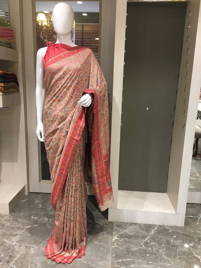Beige Modal Silk Floral Paisley Jaal Kani Weave Saree Beige Modal Silk Floral Paisley Jaal Kani Weave Saree