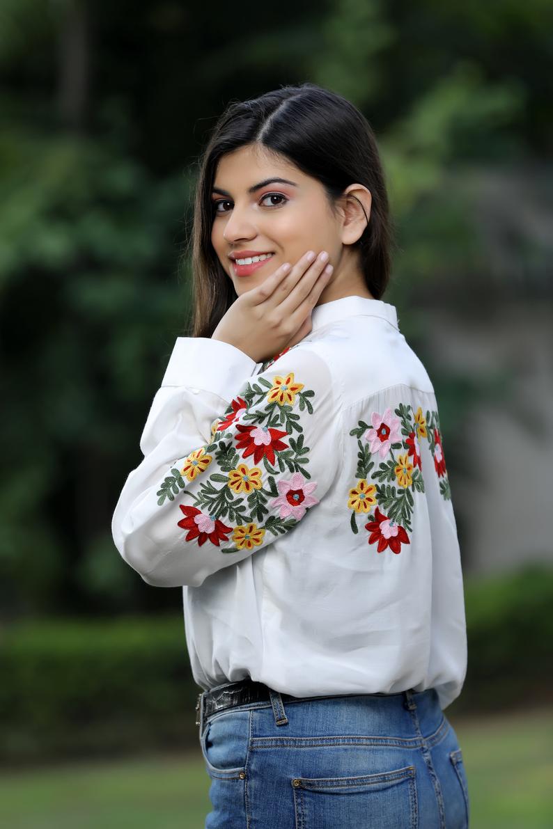 White Cotton Top with Multi Colour Thread Embroidery side White Cotton Top with Multi Colour Thread Embroidery side