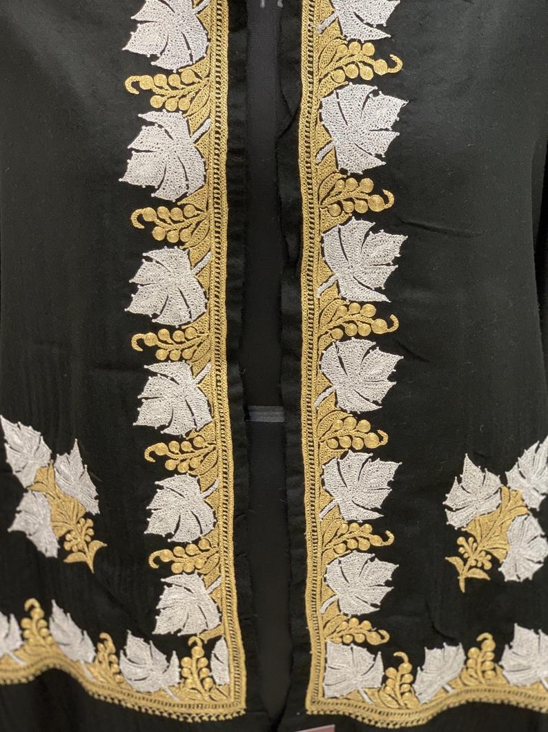 Black Pure Pashmina Shawl with Gold Silver Tilla Work close up Black Pure Pashmina Shawl with Gold Silver Tilla Work close up