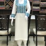 Cotton suit with stripes Embroidered neck