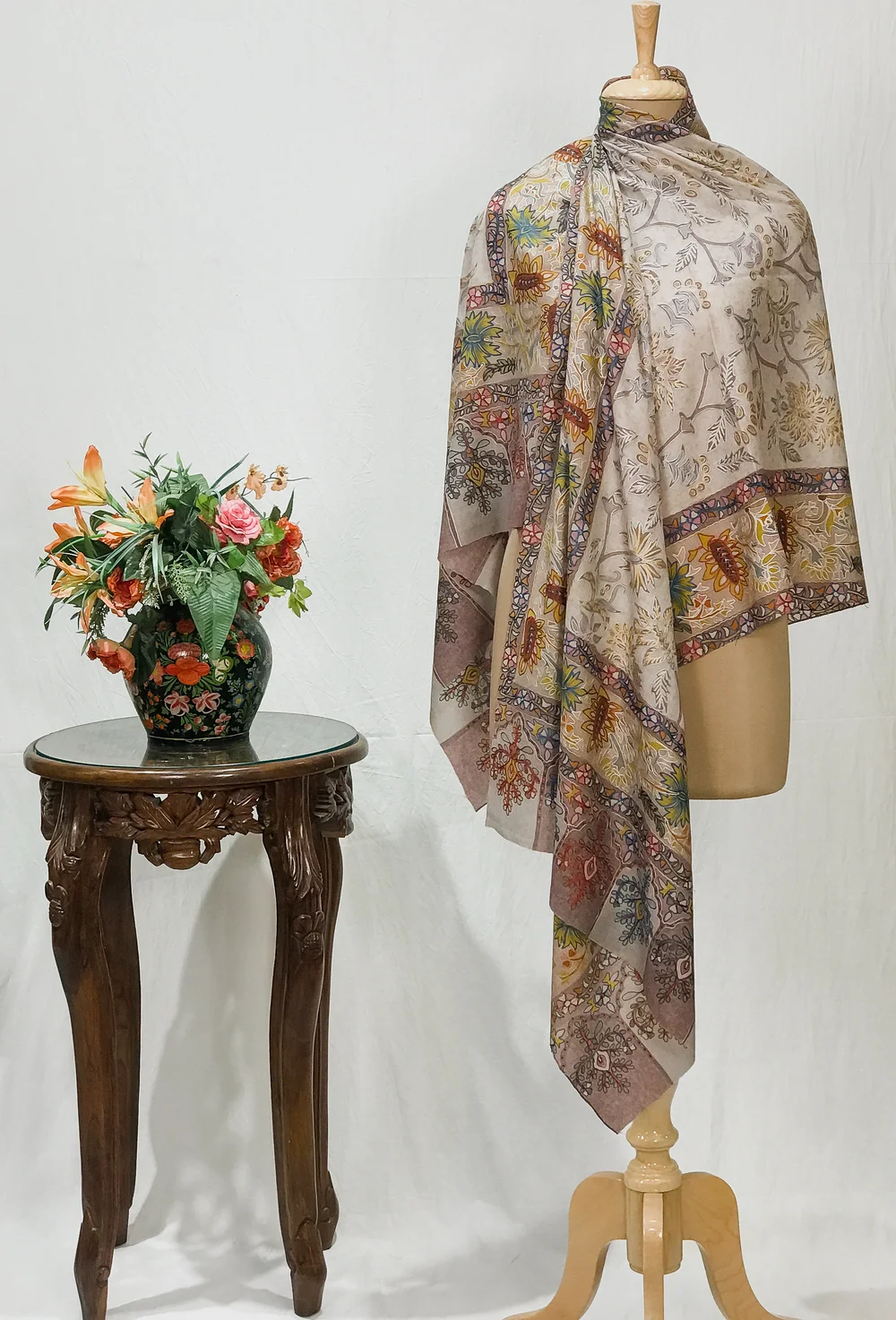 Beige Fine Wool Kalamkari Stole with Pastel Multi-Colour Embroidery Beige Fine Wool Kalamkari Stole with Pastel Multi-Colour Embroidery