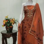 Rust Pure Wool Salwar Suit with Tilla and Aari Embroidery