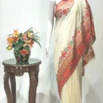 Cream Modal Silk Kani Saree with Floral Design
