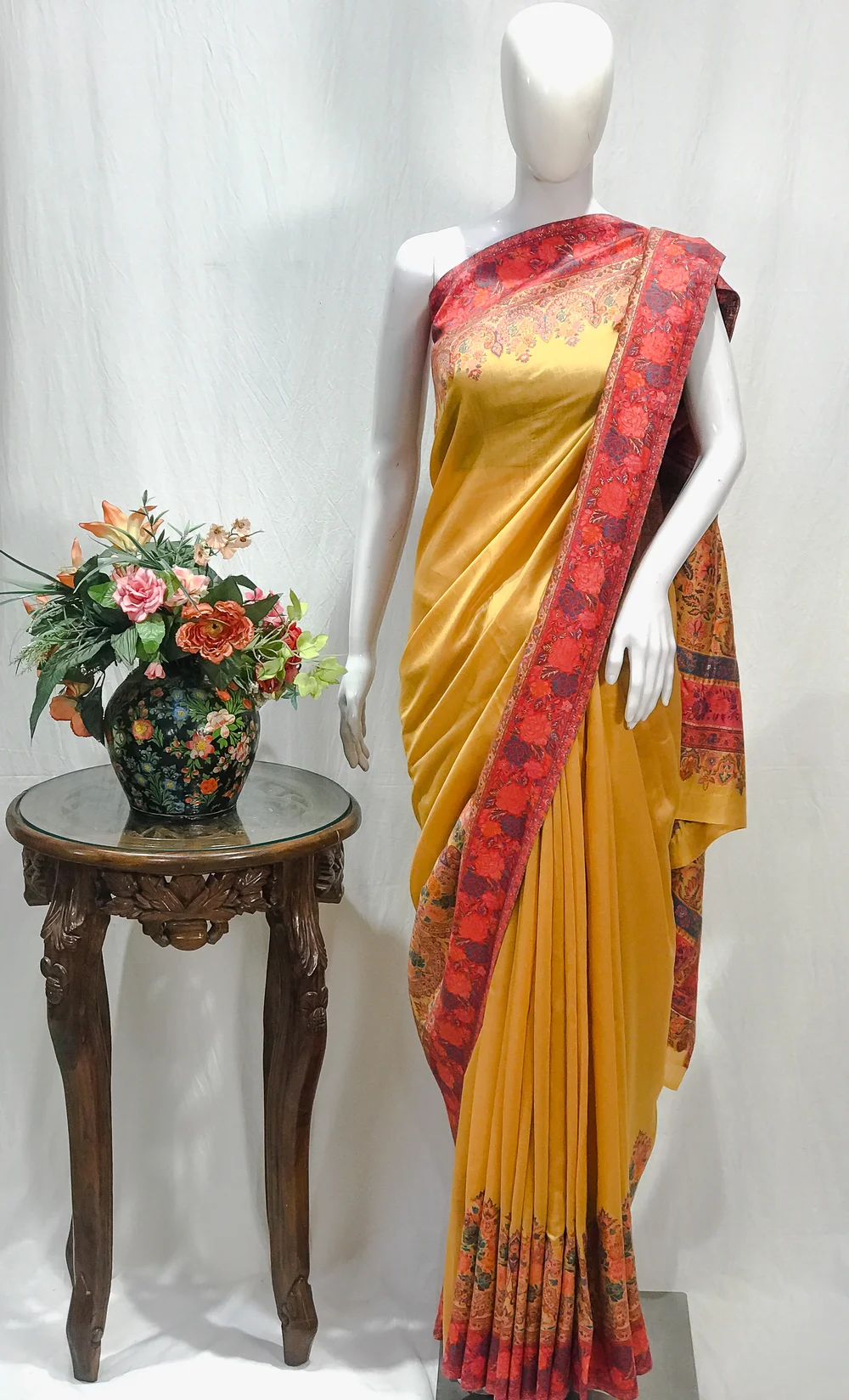 Yellow with Pink Border Modal Silk Kani Saree with Floral Pallu Design Yellow with Pink Border Modal Silk Kani Saree with Floral Pallu Design