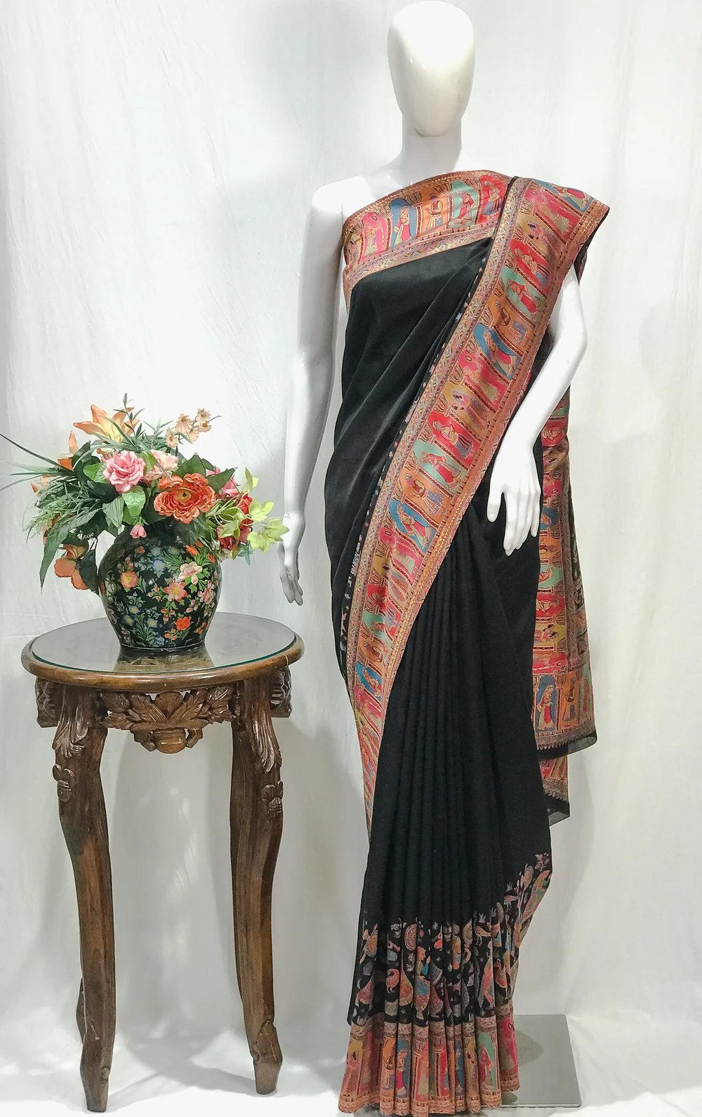 Black Modal Silk Kani Saree with Indian Tribal Figures Pallu Design Black Modal Silk Kani Saree with Indian Tribal Figures Pallu Design