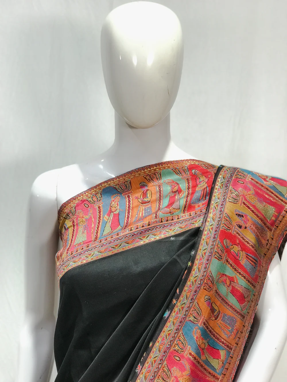 Black Modal Silk Kani Saree with Indian Tribal Figures Pallu Design front Black Modal Silk Kani Saree with Indian Tribal Figures Pallu Design front