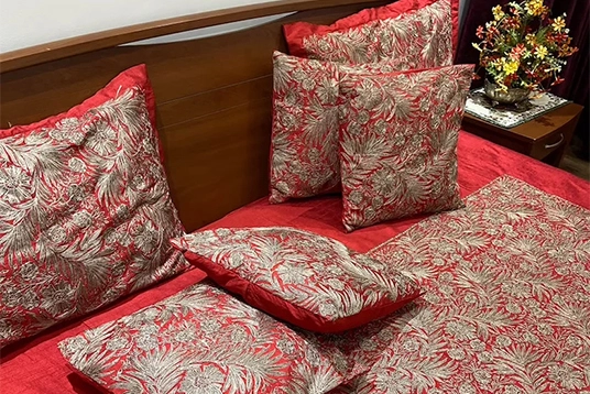 Bed Cover with Red and Golden Design