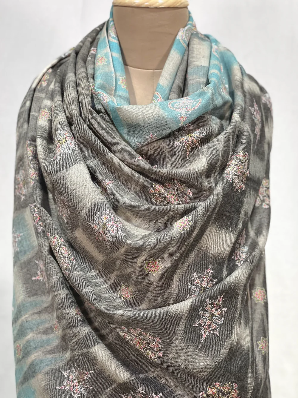 Pure Pashmina Grey Ikat Shawl With Floral Hand Embroidery close up Pure Pashmina Grey Ikat Shawl With Floral Hand Embroidery close up