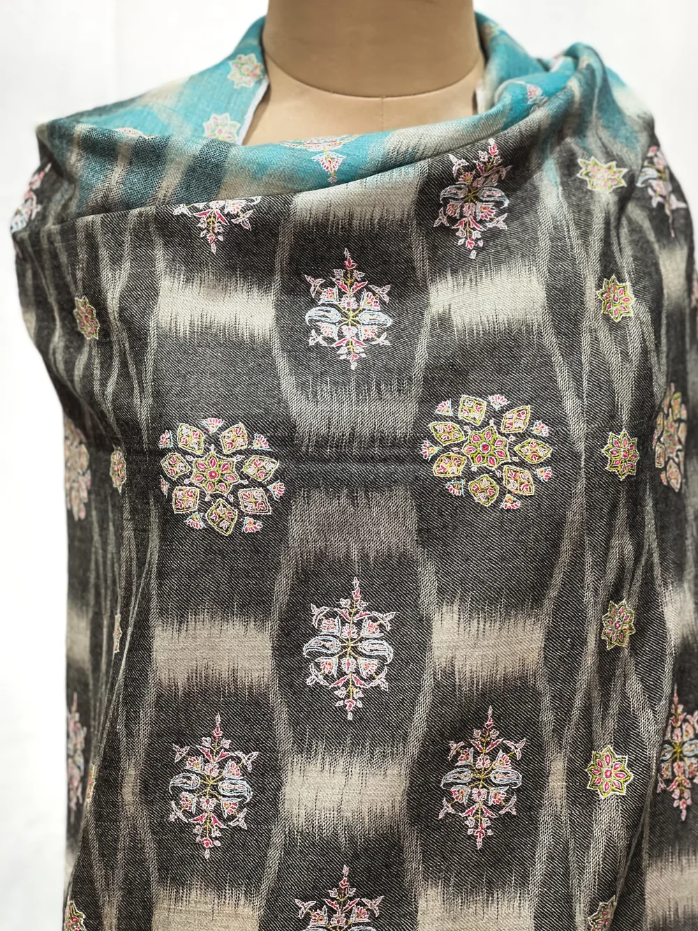 Pure Pashmina Grey Ikat Shawl With Floral Hand Embroidery Pure Pashmina Grey Ikat Shawl With Floral Hand Embroidery