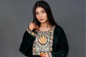 A girl with kashmiri velvet phiran