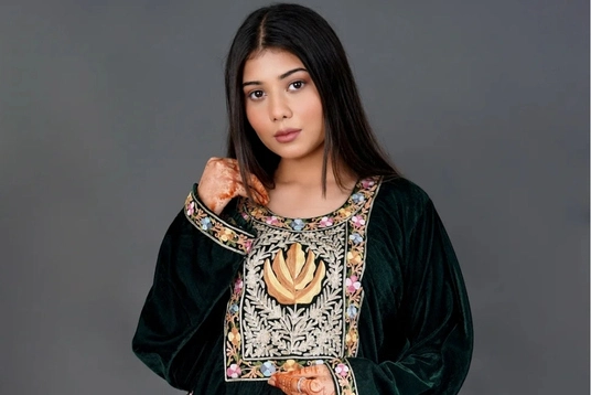 A girl with kashmiri velvet phiran