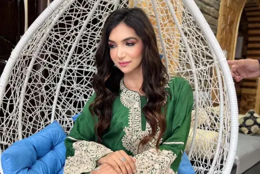 Lady wearing green designer kurti