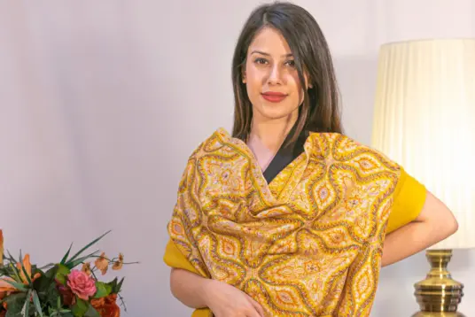 women wearing pure yelllow pashmina shawl